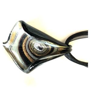 Pendant necklace on ribbon and leather chain